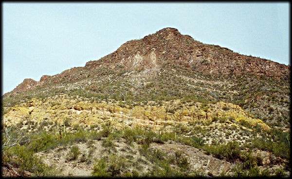 Yellow layers of Tertiary age volcanic ash are visible near Castle Hot Springs, near Lake Pleasant, northwest of Phoenix, Arizona.
