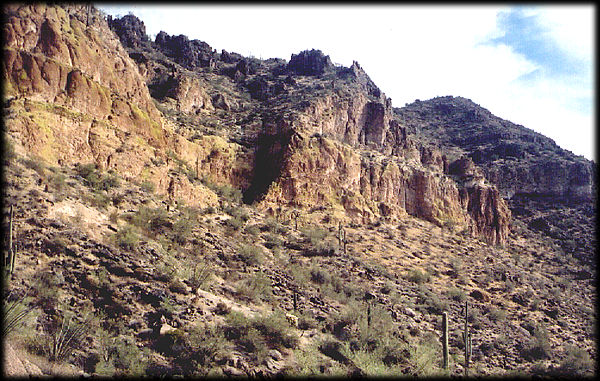 Layers of Teriary age volcanic ash (Geronimo Head Formation) form colorful shapes in Arizona's Usery and Superstition Mountains, east of Phoenix