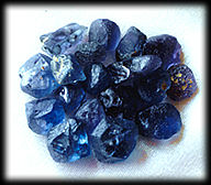 Yogo Sapphire crystals, as found in Yogo Gulch, Montana -- natural, non heat-treated gemstones.