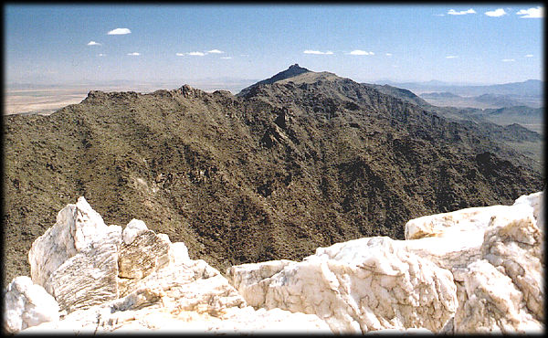 Massive quartz boulders cover the foreground in this view of the Sierra Estrella, near Phoenix, Arizona.
