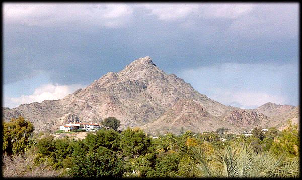 Located almost in the geographic center of the city, Squaw Peak (aka Piestewa Peak) dominates the Phoenix skyline.