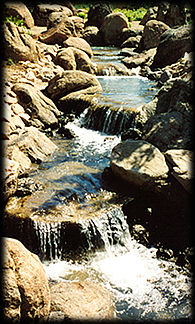 A waterfall tumbles serenely in the Japanese Friendship Garden in downtown Phoenix, Arizona.